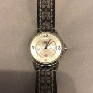 Women’s black Coach watch